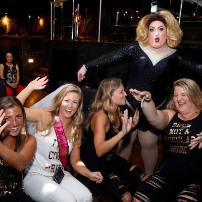 a group of people posing for the camera